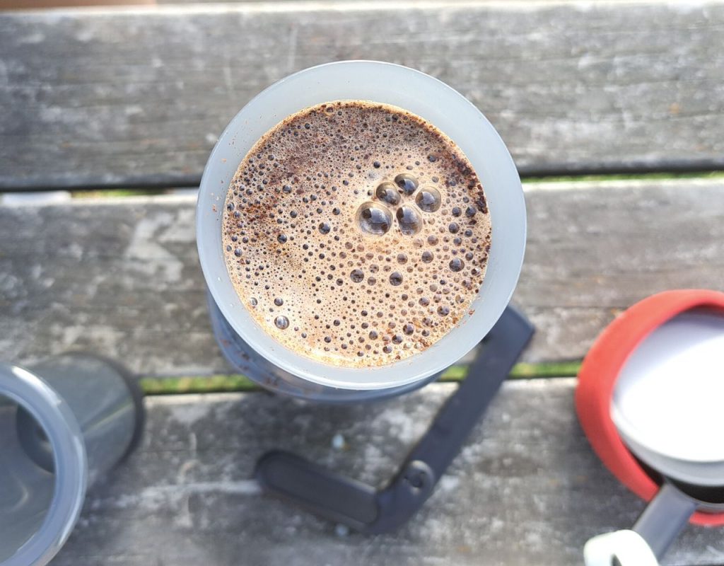 The Green Pods waiting and stiring aeropress to make it taste stronger