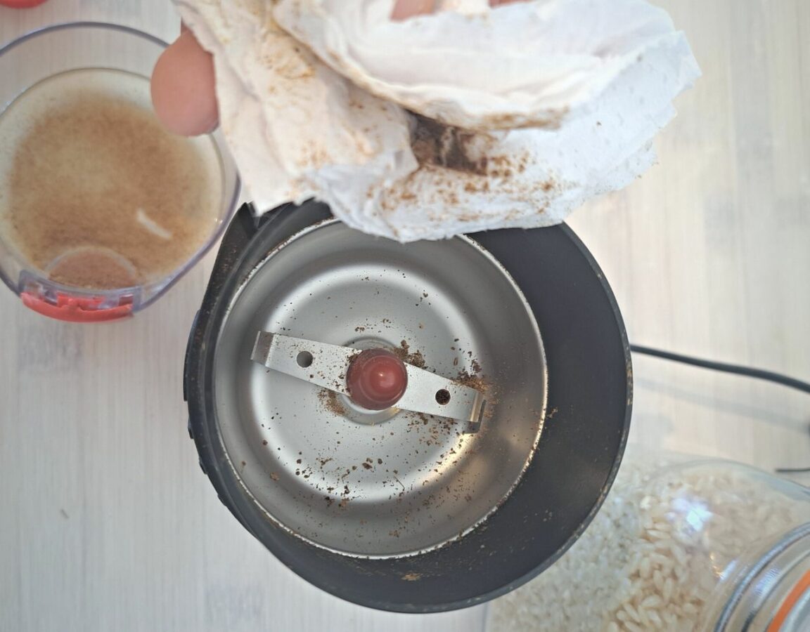 How To Clean Bodum Coffee Grinder (Complete Guide) 4 The Green Pods wiping down bodum coffee grinder