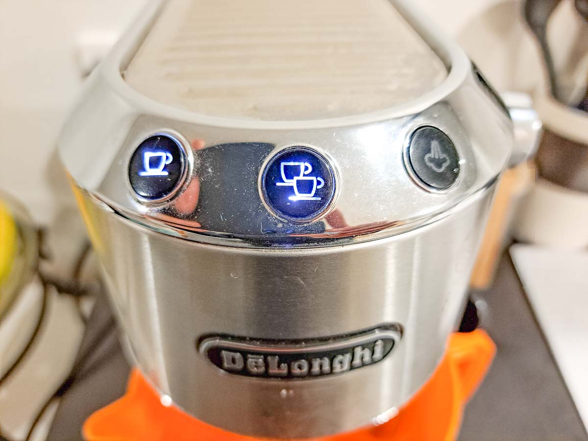 How To Descale Your Delonghi Dedica Machine (3 Simple Steps) 19 The Green Pods descaling lights on delonghi dedica once descaling is complete