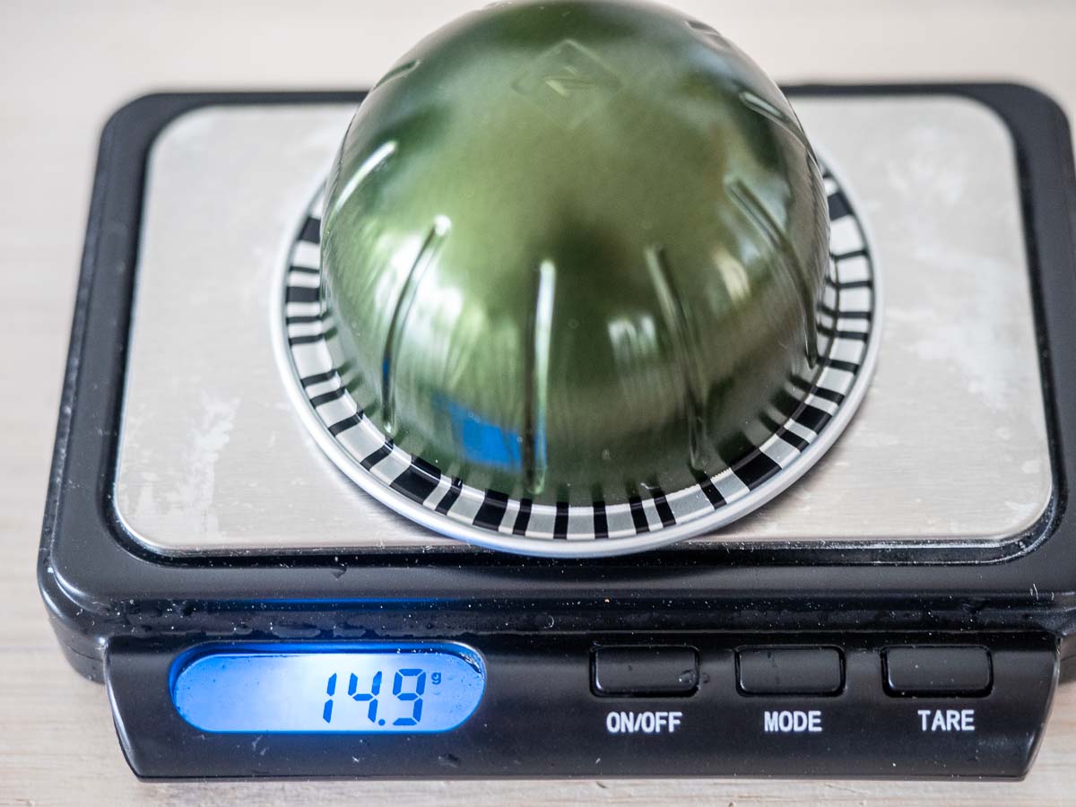 Nespresso Stormio Review and Key Info (Read Before Buying) 2 Nespresso stormio weight stormio capsule being weighted on a set of scales