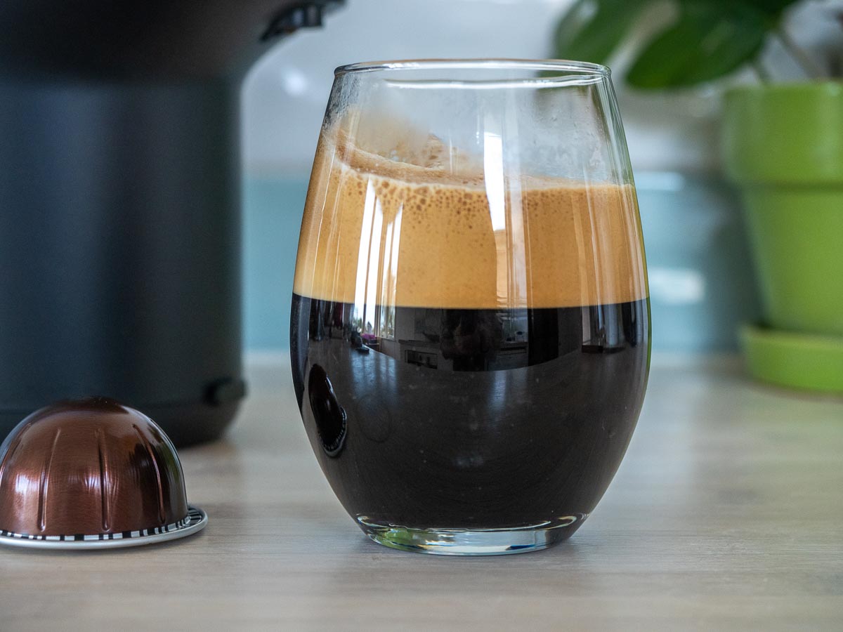 Nespresso Intenso Review And Key Info (Read Before Buying) 5 The Green Pods glass of brewed nespresso intenso coffee